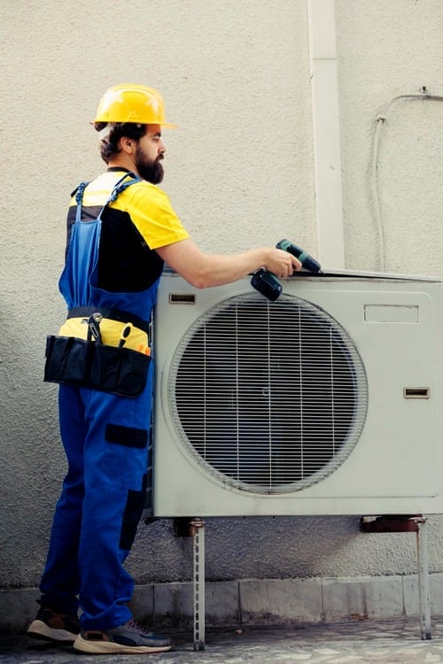 technician-working-air-conditioner