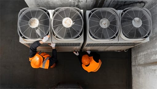 men-working-with-equipment-full-shot