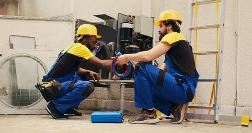 plumbers working