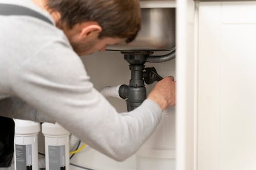 service maintenance worker repairing
